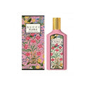 Gucci Flora perfume bottle and packaging with floral design on a white background