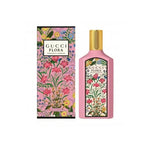 Gucci Flora perfume bottle and packaging with floral design on a white background